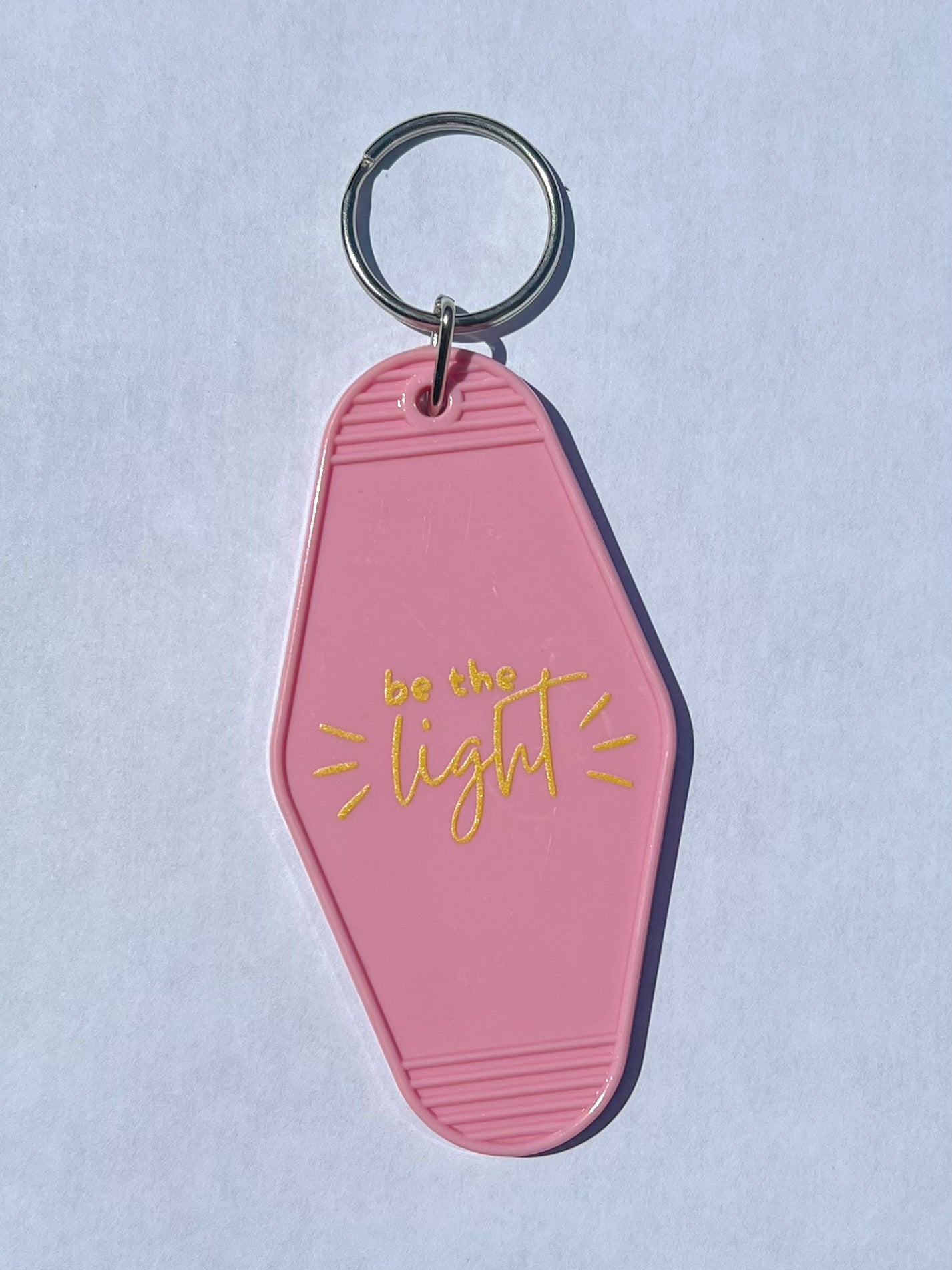 Be The Light Motel Keychain