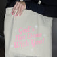 God's Not Done Tote Bag
